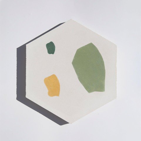 Green and yellow hexagonal terrazzo style cement tile designed by Glazentile