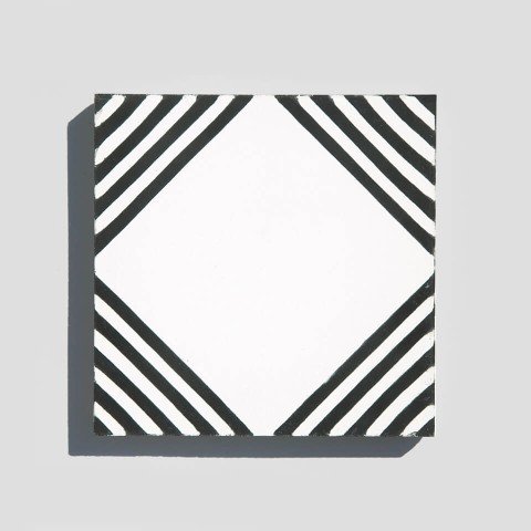 Black and white concentric square cement tile designed by Glazentile