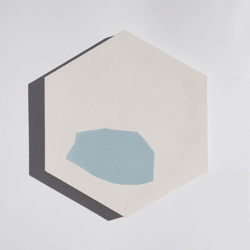 Blue and white hexagonal terrazzo style cement tile designed by Glazentile